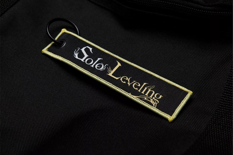 Solo Leveling: Ore dake Level Up na Ken Embroidered Jet Tag featuring Cha Hae-In, the Shadow Monarch symbol, and his iconic dual daggers. Crafted from durable, high-quality materials with bold, double-sided embroidery, this jet tag perfectly captures the intense action and dark fantasy of Solo Leveling. Perfect for keys, backpacks, or cars, this collectible is a must-have for fans of Sung Jin-Woo’s journey and anime enthusiasts who love epic leveling-up stories. Show off your love for Solo Leveling