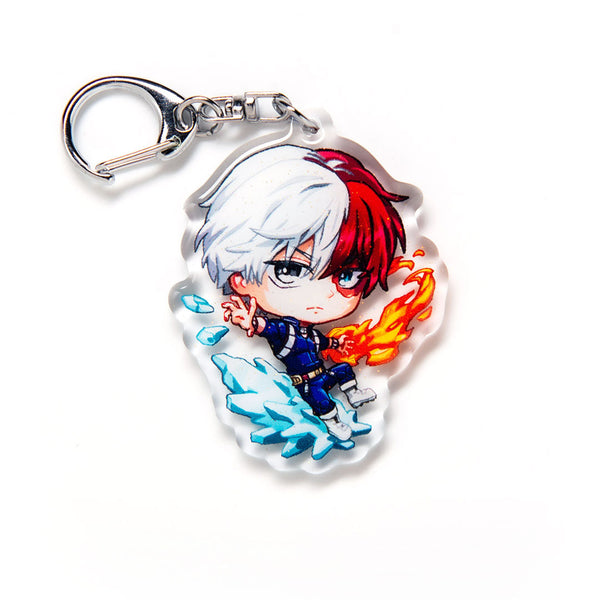 Exclusive My Hero Academia acrylic keychain featuring double-sided designs of fan favorites like Deku, Bakugo, and Todoroki. Eye-catching, vibrant, scratch-resistant colors with glitter epoxy coating. Ideal for backpacks, lanyards, and Ita bags. Durable silver D-clasp for lasting use. Perfect collectible and gift for anime fans and MHA lovers!