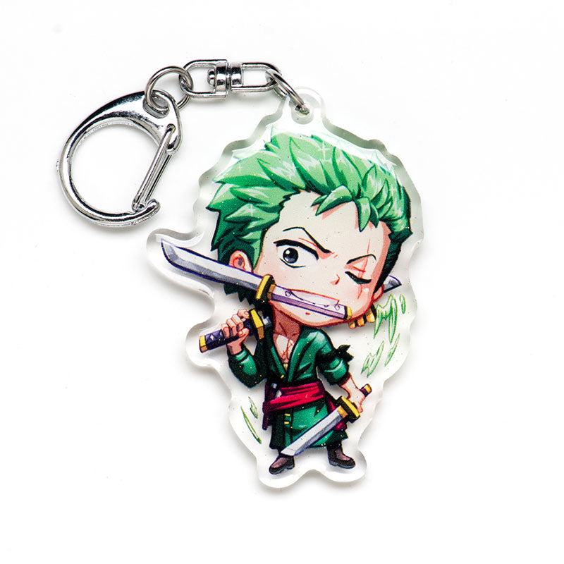 Limited edition One Piece acrylic keychain featuring double-sided designs of Luffy, Zoro, and Nami. Bold, vibrant colors with a scratch-resistant finish and glitter epoxy coating. Perfect for decorating backpacks, lanyards, and Ita bags. Durable silver D-clasp ensures long-lasting use. A must-have collectible and gift for anime fans and One Piece enthusiasts!